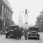 Taxi Stand, The Strand 1937. Buildings decorated for the coronation.