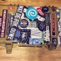 Life is just like a flight case 
You collect stickers on the road
Cover the old ones with the new
Create a big mess along the way
Yet it's a beautiful collage in the end