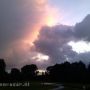 Ochtendzon achter wolk